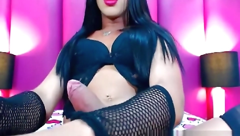 Sexy young chick fucks herself with a dildo